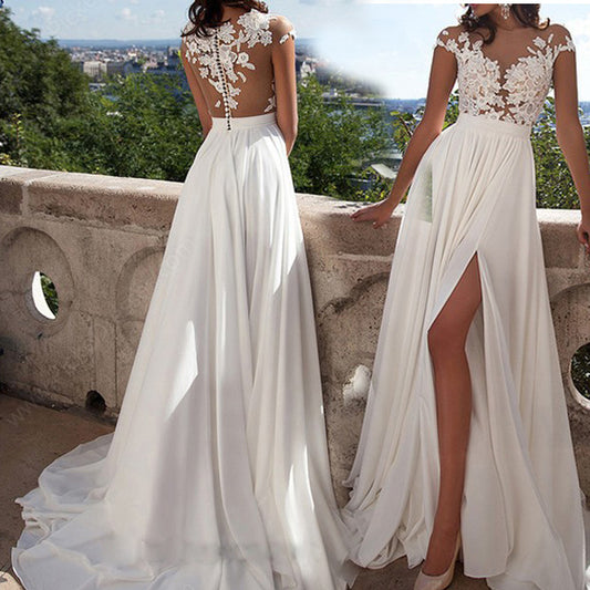 Elegant Lace Backless Wedding Gown – Flowing Bridal Dress with Floral Embroidery
